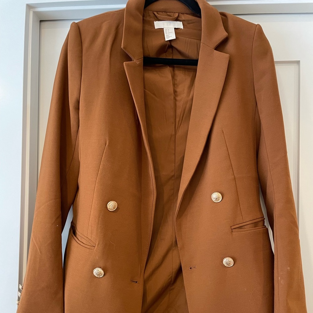 Beautiful rust colored blazer with gold accents